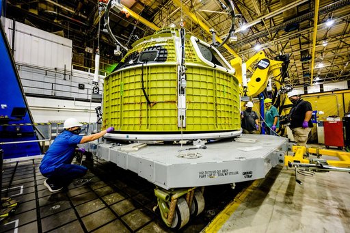 Orion crew module pressure vessel lifted from welding tool