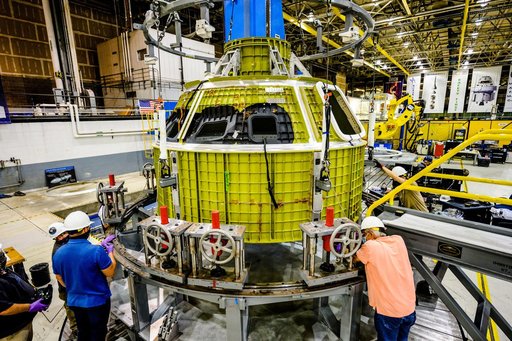 Orion crew module pressure vessel lifted from welding tool