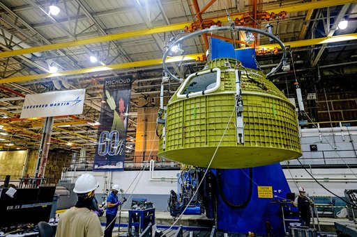Orion crew module pressure vessel lifted from welding tool