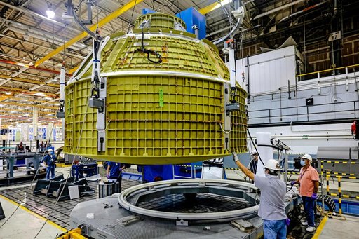 Orion crew module pressure vessel lifted from welding tool