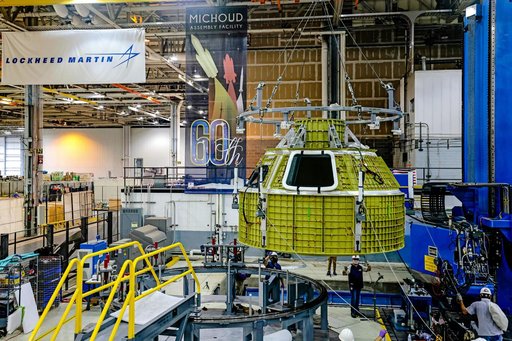 Orion crew module pressure vessel lifted from welding tool
