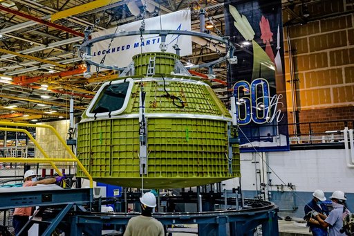 Orion crew module pressure vessel lifted from welding tool