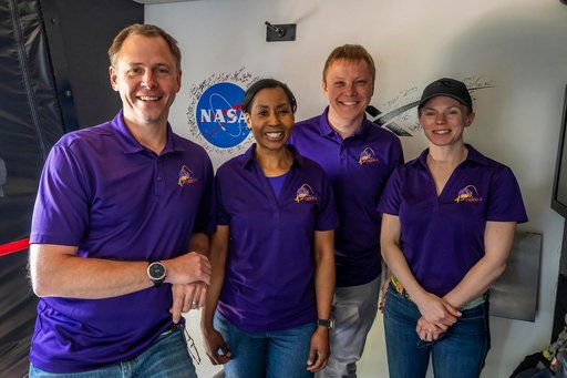 NASA’s SpaceX Crew-9 members poses for a group photo