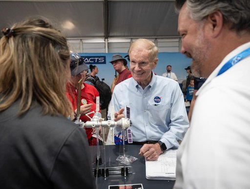 NASA Administrator Bill Nelson views model of Gateway at EAA AirVenture Oshkosh 2024