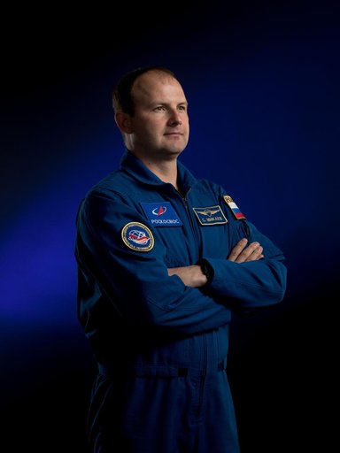 Roscosmos cosmonaut Sergey Mikaev poses for a portrait at NASA's Johnson Space Center