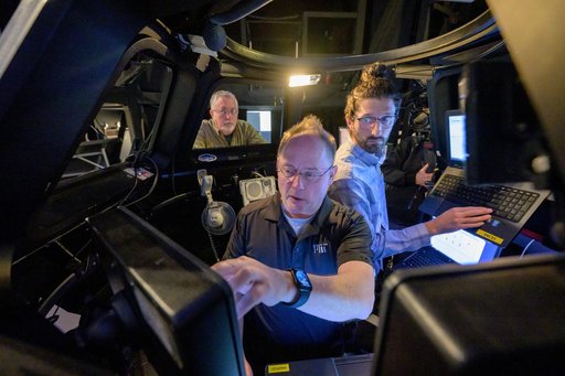 NASA astronaut Mike Fincke brushes up on space station robotics skills