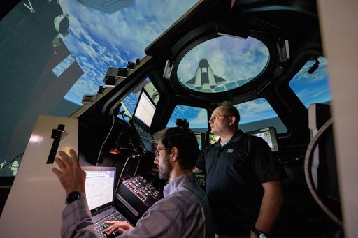 NASA astronaut Mike Fincke brushes up on space station robotics skills