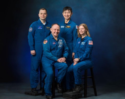 The official portrait of the four members of NASA's SpaceX Crew-11 mission