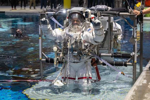 NASA astronaut Anil Menon participates in a spacewalk training session