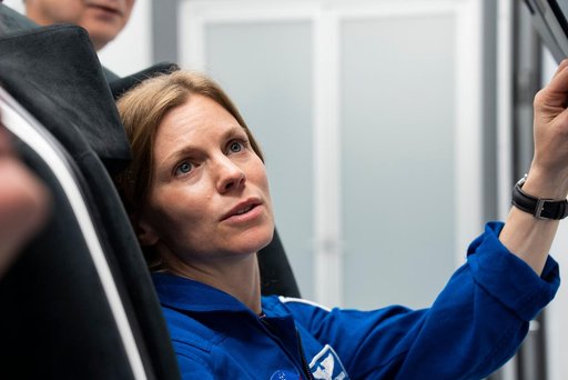 Astronaut Zena Cardman trains inside a Dragon training crew spacecraft