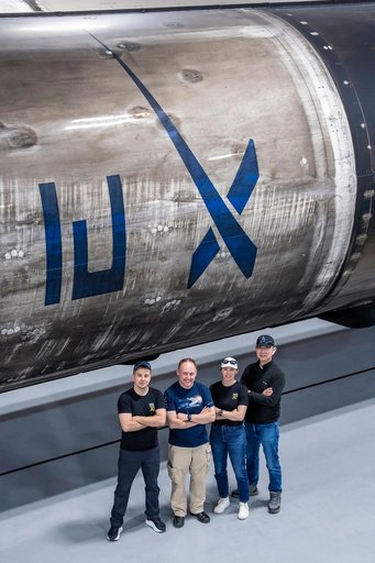 NASA's SpaceX Crew-11 members pose for a portrait at SpaceX's Hangar X