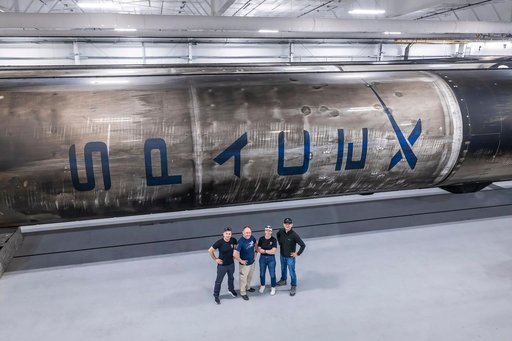 NASA's SpaceX Crew-11 members pose for a portrait at SpaceX's Hangar X