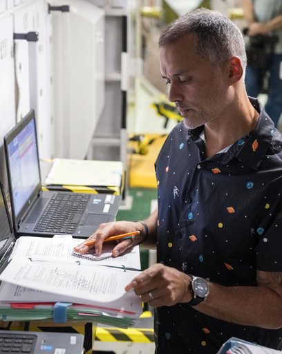NASA astronaut Anil Menon participates in a training session at Johnson Space Center