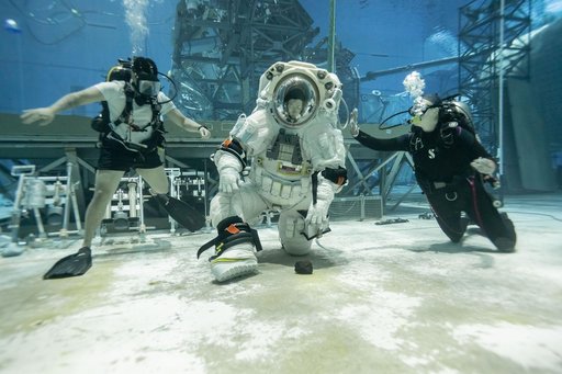 NASA Astronauts Complete First Dual Suit Run Wearing AxEMU