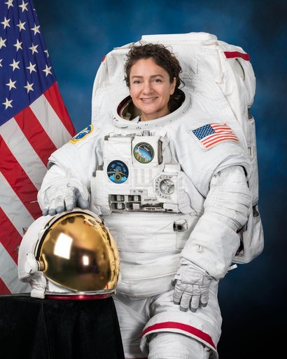 Official portrait of NASA astronaut Jessica Meir wearing a spacesuit
