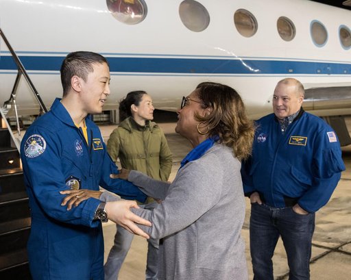 NASA astronaut Jonny Kim is greeted by Johnson Space Center Director Vanessa Wyche
