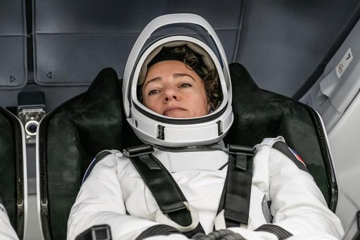 NASA astronaut Jessica Meir is photographed inside the Dragon spacecraft