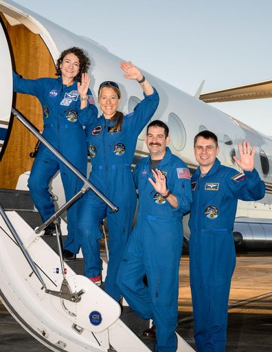 Four crew members representing NASA's SpaceX Crew-12 mission