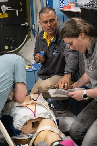 Expedition 75 crew members participate in an emergency training session at Johnson Space Center