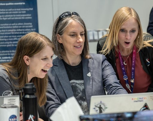 Artemis II lunar science team members celebrate the lunar flyby -- jsc2026e020762
