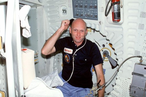 Pilot Fullerton uses hairbrush on middeck