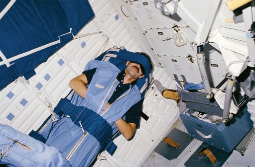 Mission Specialist (MS) Gardner sleeps in middeck sleep restraint