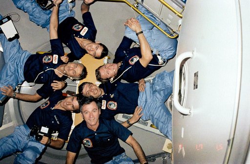 Portrait of STS-9 crew in the Spacelab