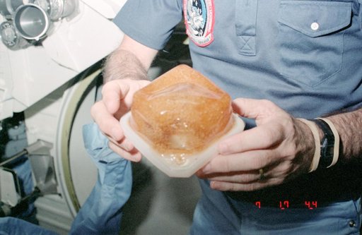 Water and coffee in beverage container during STS-9 flight