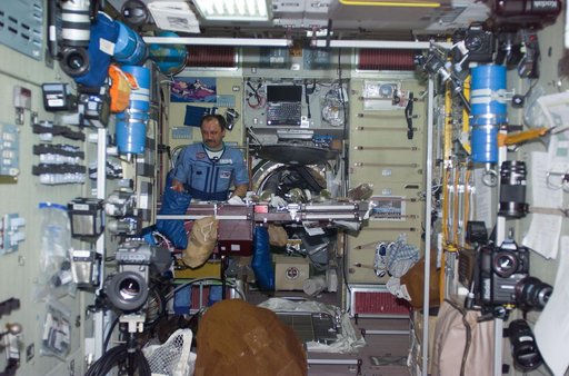 Usachev at ward room table in Service Module