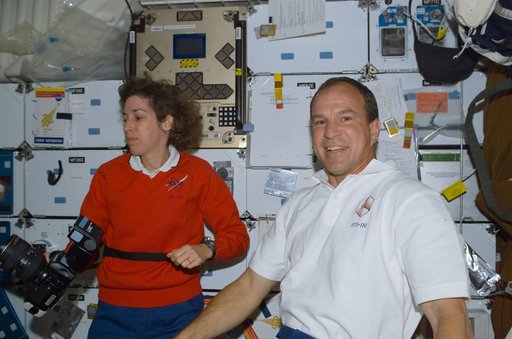 Commander Bloomfield and MS Ochoa pose on the middeck of Atlantis during STS-110