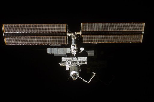 Forward - zenith view of the ISS taken during STS-110's undocking and final flyaround