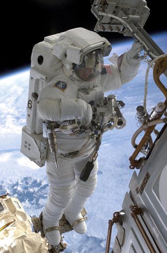 MS Sellers connects cables during EVA 2