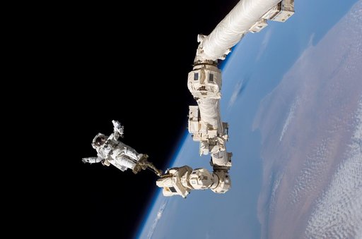 EVA 3 - Robinson on Canadarm2