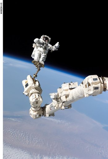 EVA 3 - Robinson on Canadarm2