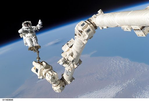 EVA 3 - Robinson on Canadarm2