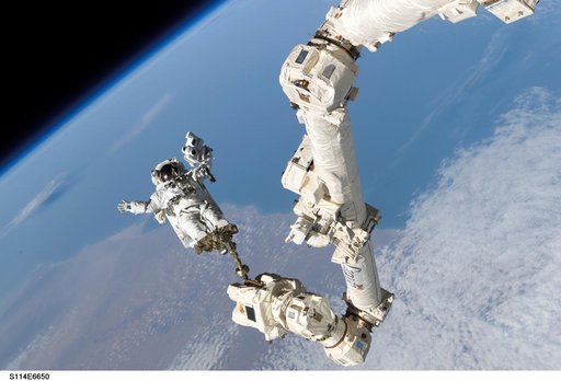 EVA 3 - Robinson on Canadarm2