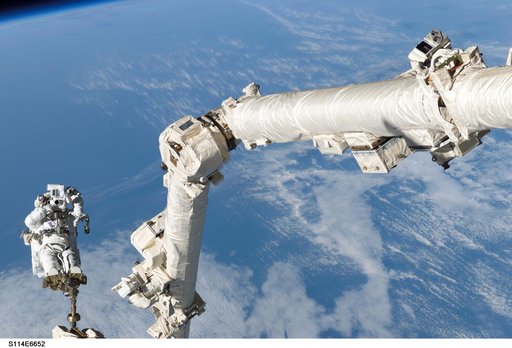EVA 3 - Robinson on Canadarm2