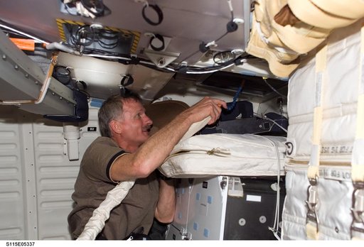 STS-115 MS Tanner on Atlantis Middeck