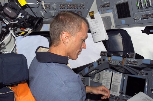 STS-115 Commander Jett on the FD of the Space Shuttle Atlantis as it approaches the ISS