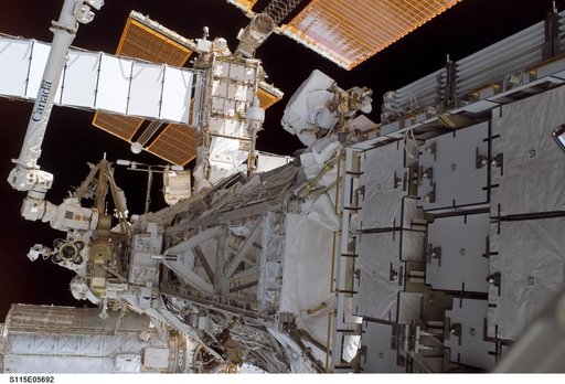 Tanner performs first EVA during STS-115 / Expedition 13 joint operations