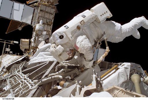 Stefanyshyn-Piper performs first EVA during STS-115 / Expedition 13 joint operations