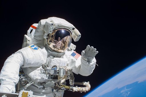 Tanner performs first EVA during STS-115 / Expedition 13 joint operations