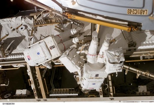 MacLean and Burbank performing second EVA spacewalk