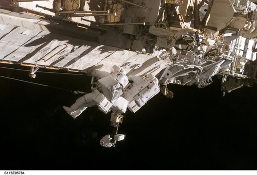 MacLean and Burbank performing second EVA spacewalk