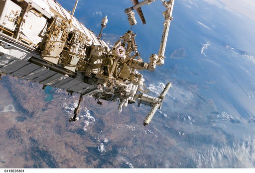MacLean and Burbank performing second EVA spacewalk