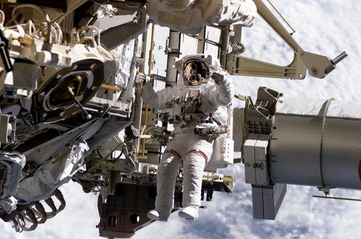 STS-115 MS Burbank prepares the SARJ on the P3 - P4 Truss Segment during EVA