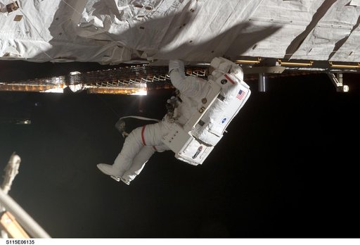 STS-115 MS Tanner working on the P3/P4 Truss during EVA