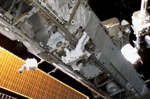 STS-115 MS Stefanyshyn-Piper removes and replaces the S-Band Antenna BSP and XPDR during EVA