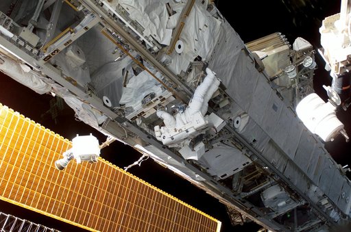 STS-115 MS Stefanyshyn-Piper removes and replaces the S-Band Antenna BSP and XPDR during EVA