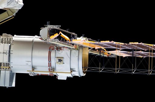 Deployment of the P4 Truss SAW during Expedition 13 / STS-115 Joint Operations